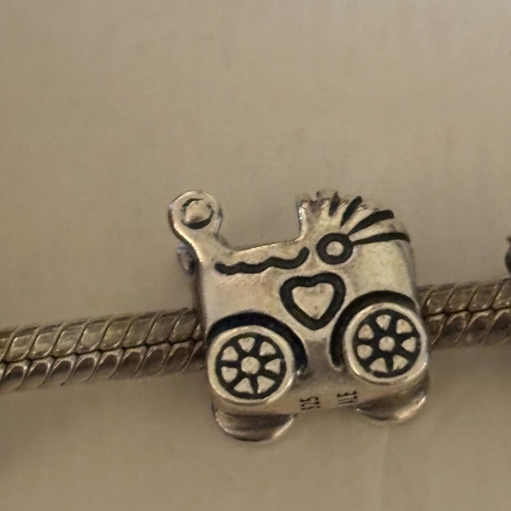Silver Baby Carriage pram Charm Pandora retired with heart in great condition